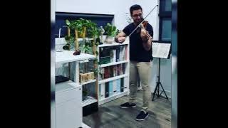 violin player with student sam karimi